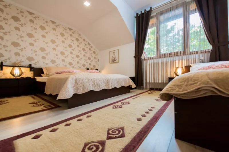 Room 1 – double bed and single bed
